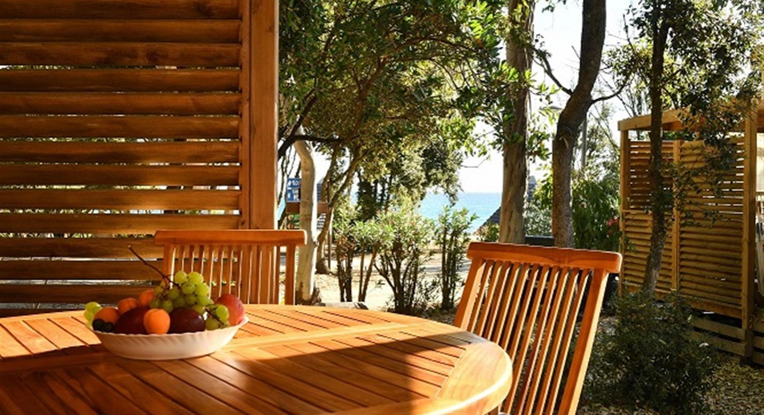 Mobil home 3 chambres vue mer - Camping naturiste Corse